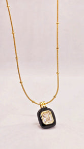 Adorniv Gold-Tone Crystal Pendant Necklace with Black Enamel Detailing