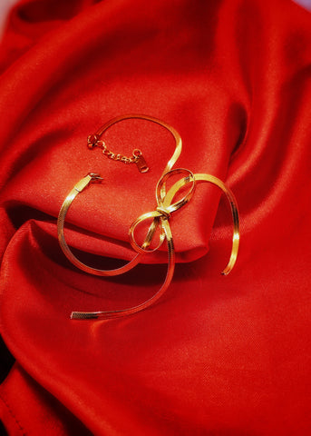 Adorniv Golden Bow Tie Bracelet