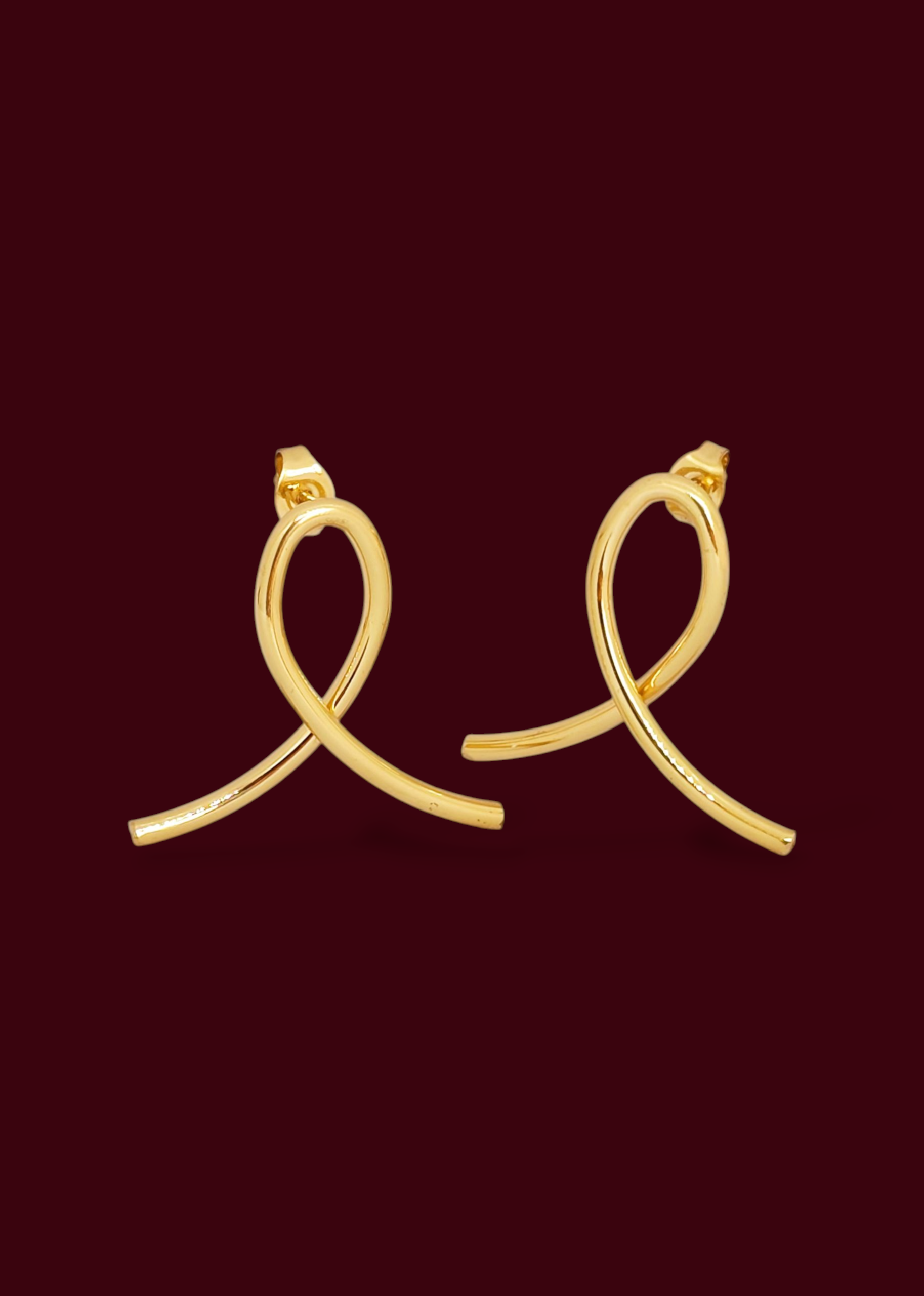 Adorniv Golden Ribbon Twist Earrings